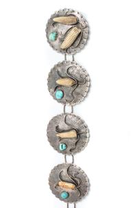 A Southwestern Silver and Turquoise Bracelet and Concho Belt, Buddy Lee Length 5 x opening 1 x width 2 1/4 inches.