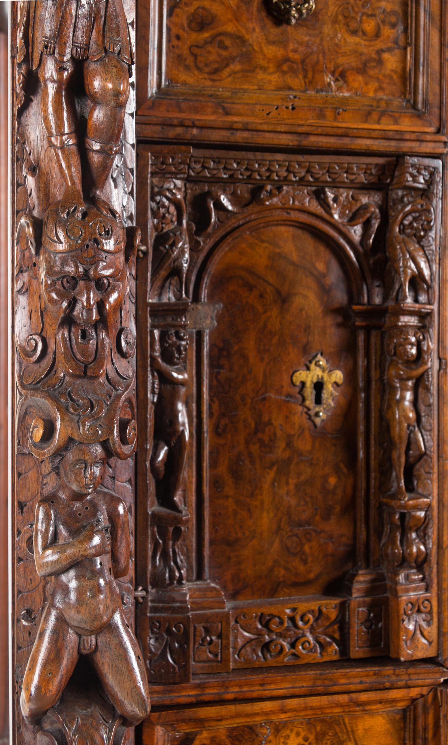An Italian Baroque Style Carved Walnut and Burl Walnut Fall-Front Bureau Cabinet