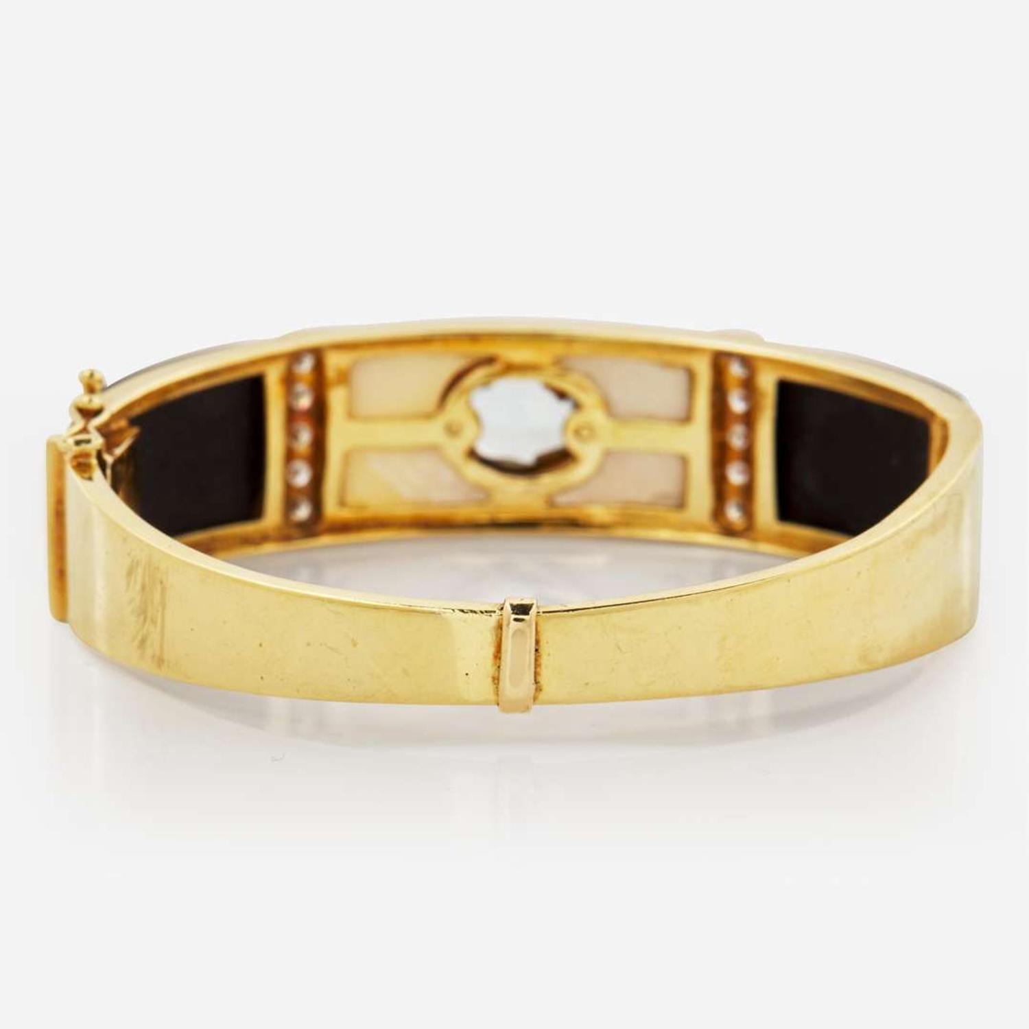 A 14K Yellow Gold and Gemstone Bangle Bracelet