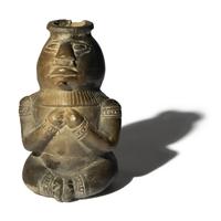 A Peruvian Blackware Effigy Vessel