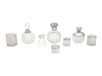 A Collection of Eight Silver Mounted Jars