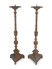 A Large Pair of Italian Baroque Style Brass Pricketsticks