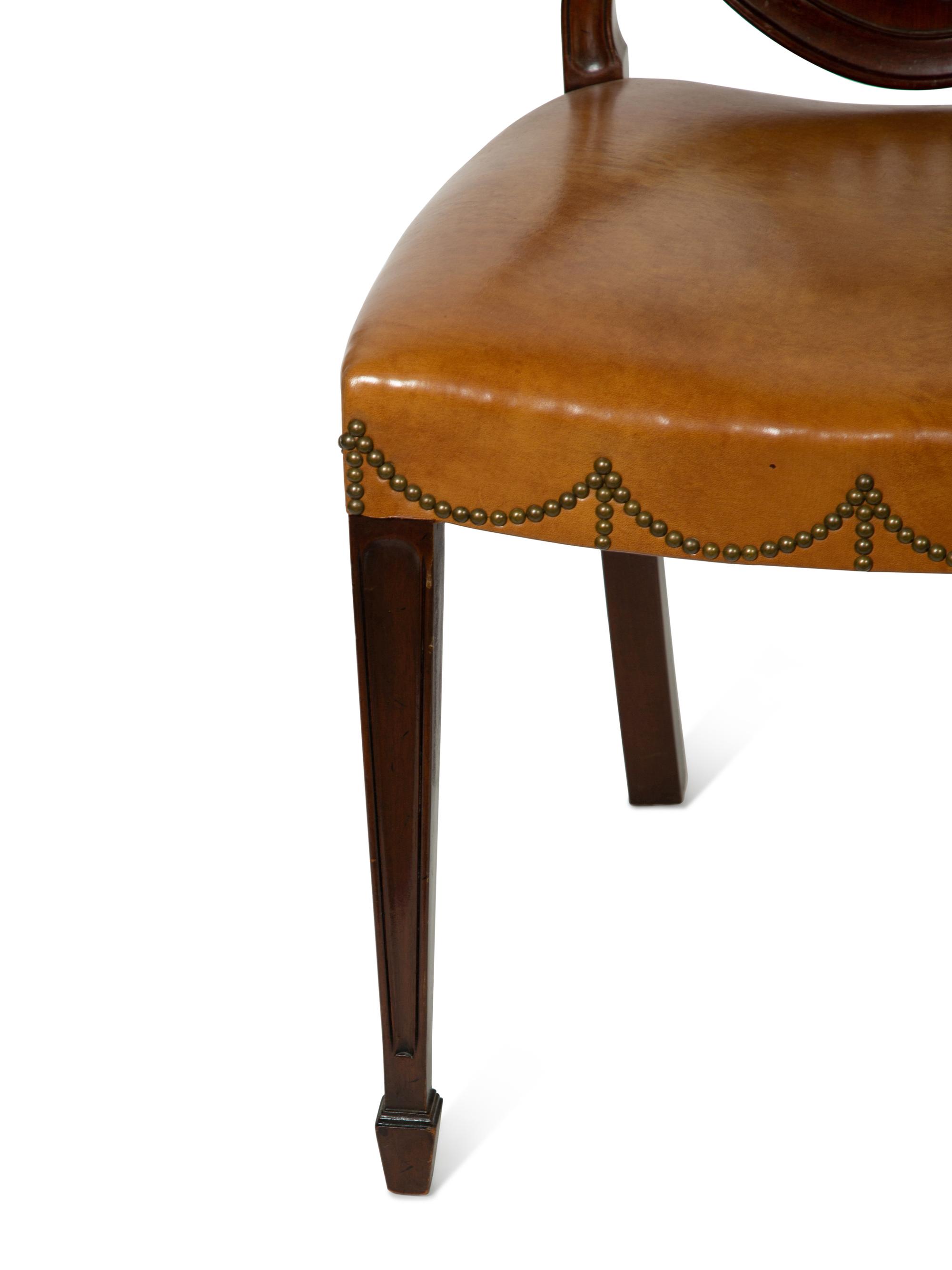 A Set of Ten George III Style Leather-Upholstered Mahogany Dining Chairs