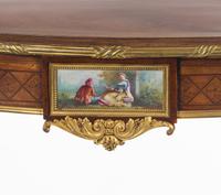 A Louis XV Style Gilt Bronze and Porcelain Mounted Two-Tier Serving Table