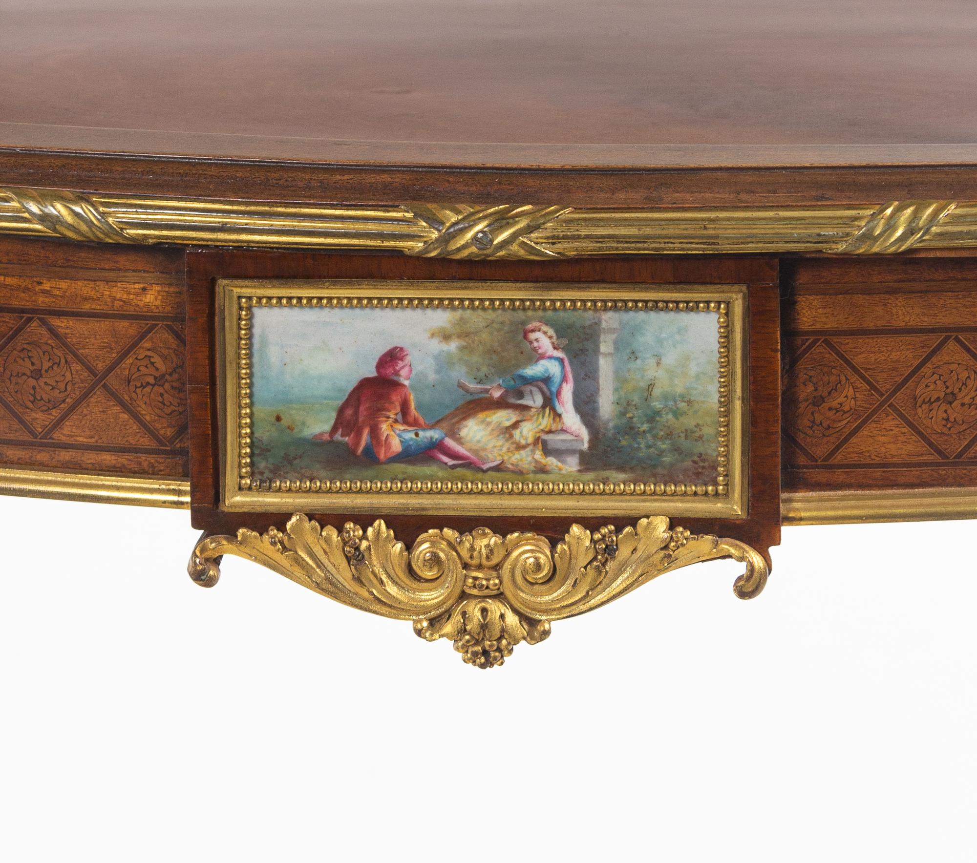 A Louis XV Style Gilt Bronze and Porcelain Mounted Two-Tier Serving Table