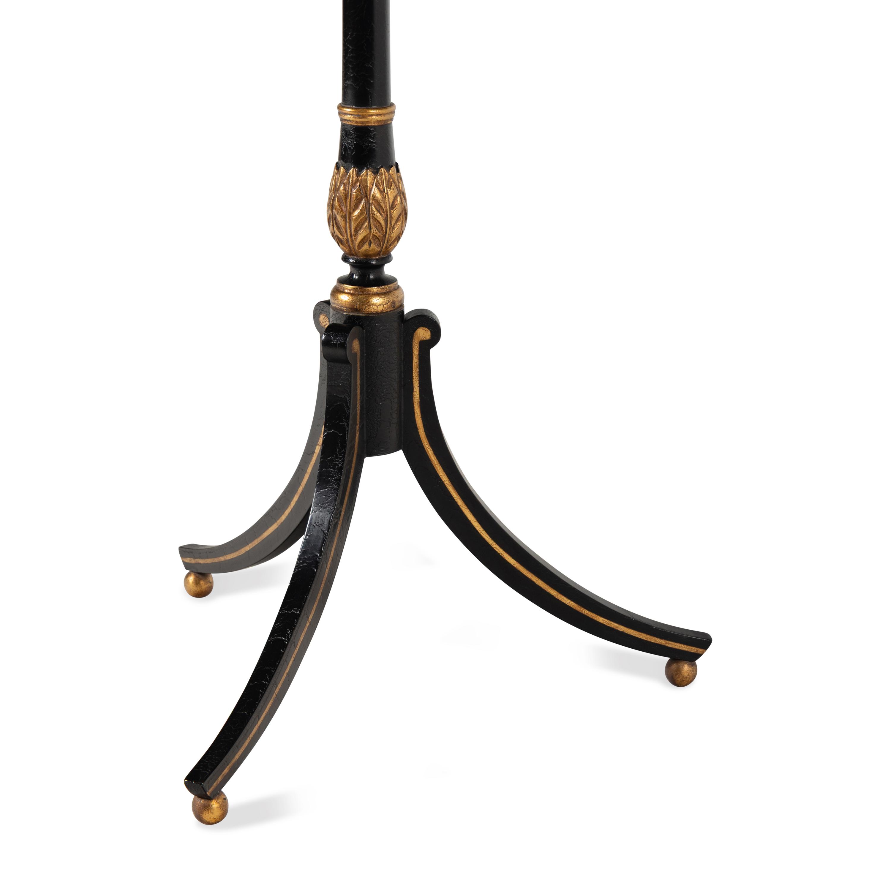 An Ebonized and Parcel Gilt Floor Lamp