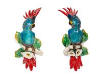 A Pair of Polychrome Glazed Earthenware Parrot Wall Appliqués