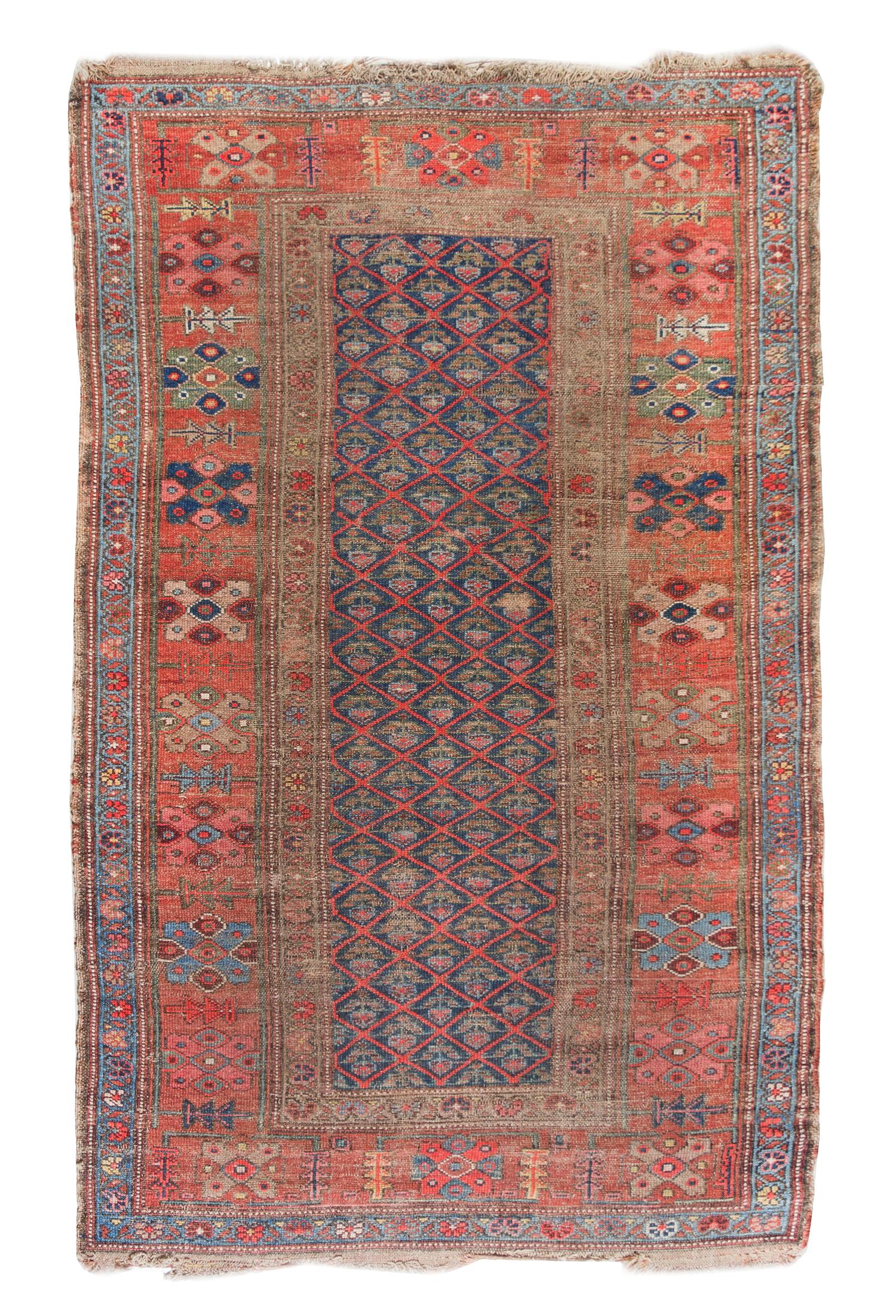 A Caucasian Wool Rug 6 feet 2 inches x 3 feet 8 inches. — 19TH CENTURY