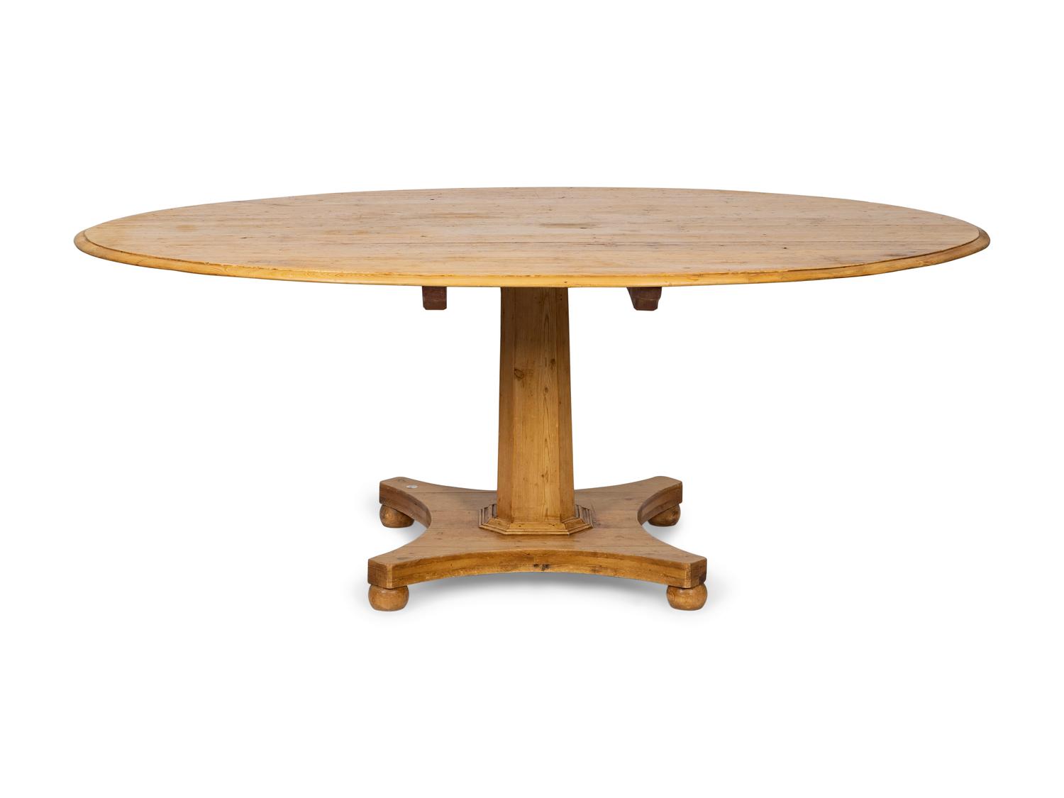 A Regency Style Pine Tilt-Top Table — INCORPORATING 19TH CENTURY ELEMENTS