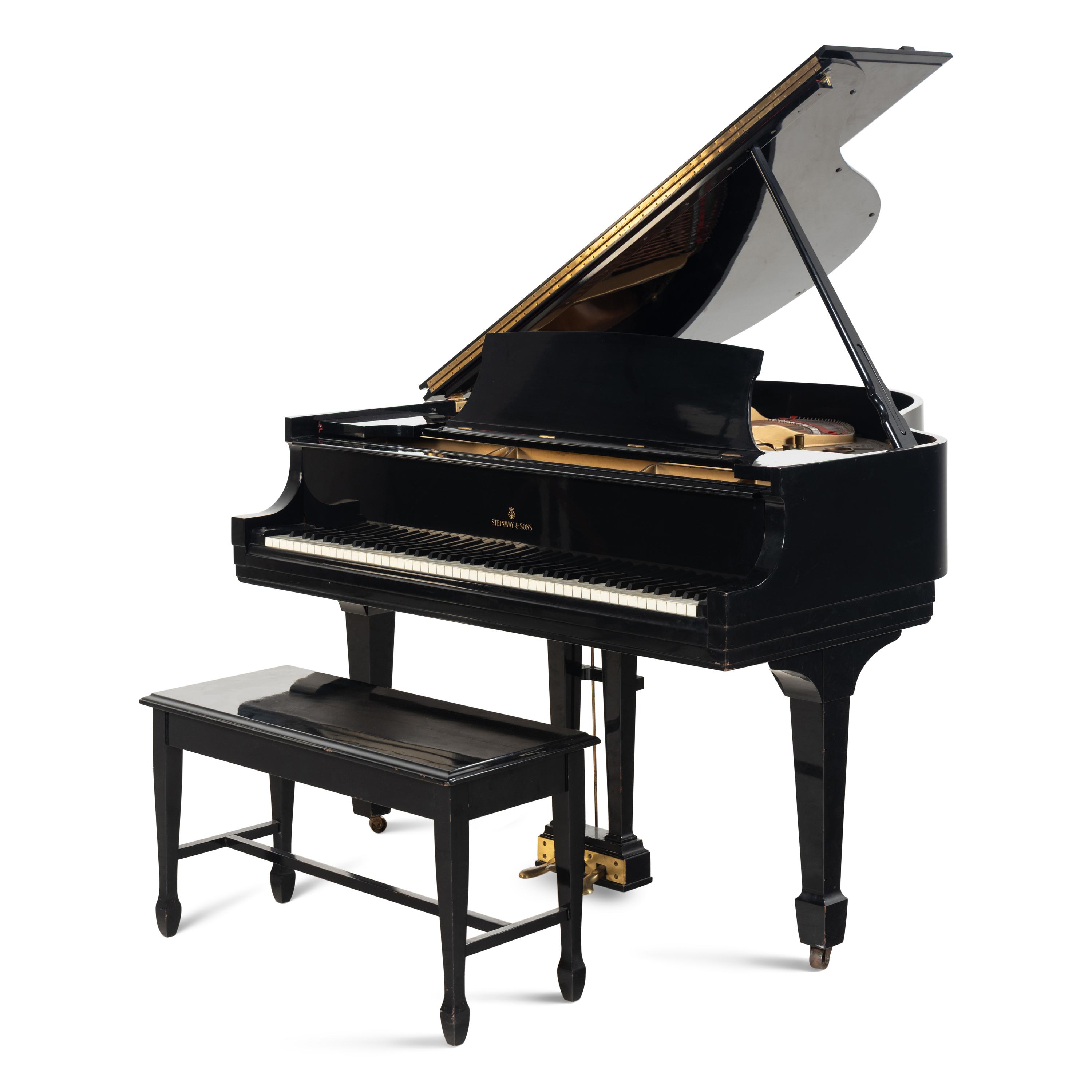 A Steinway and Sons Baby Grand Piano