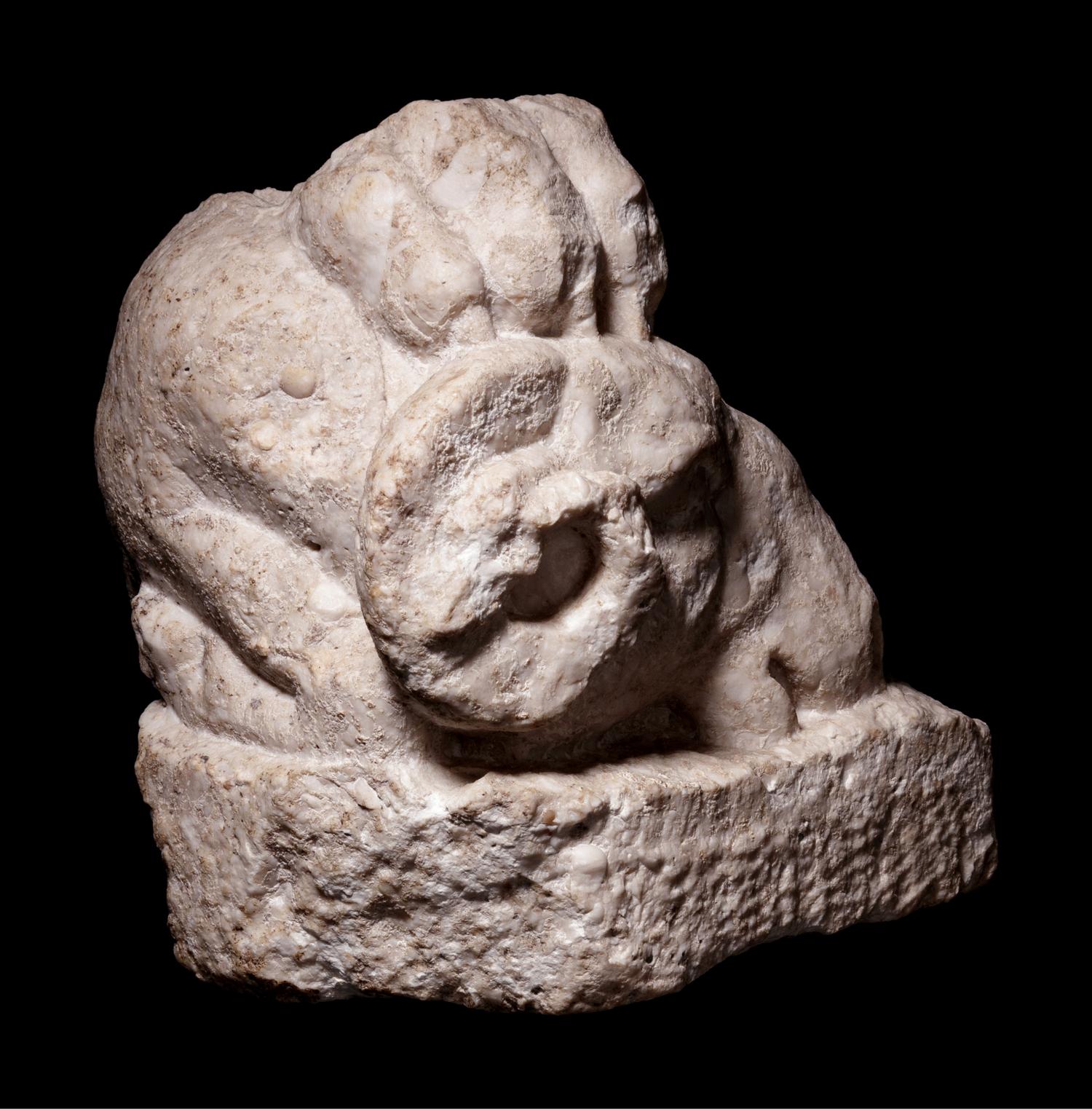 A Roman Marble Fragment with Head of Goat and Lion Paw