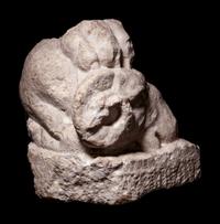 A Roman Marble Fragment with Head of Goat and Lion Paw