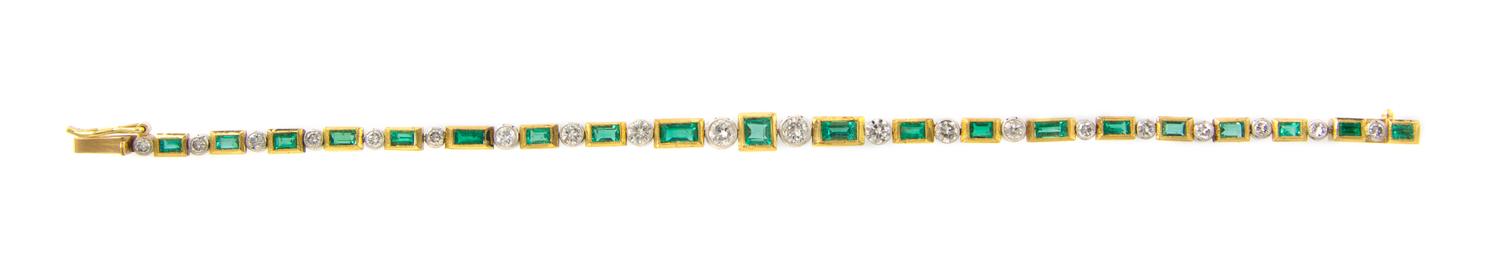 A Yellow Gold, Platinum, Emerald and Diamond Line Bracelet, 11.10 dwts.