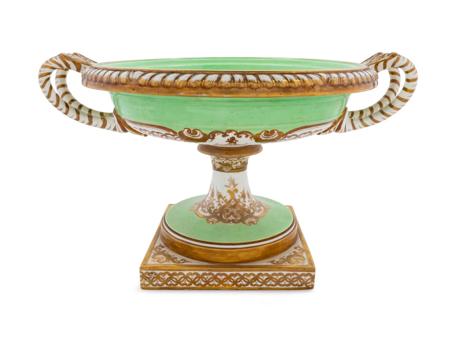 A Group of English Parcel Gilt Porcelain Table Articles