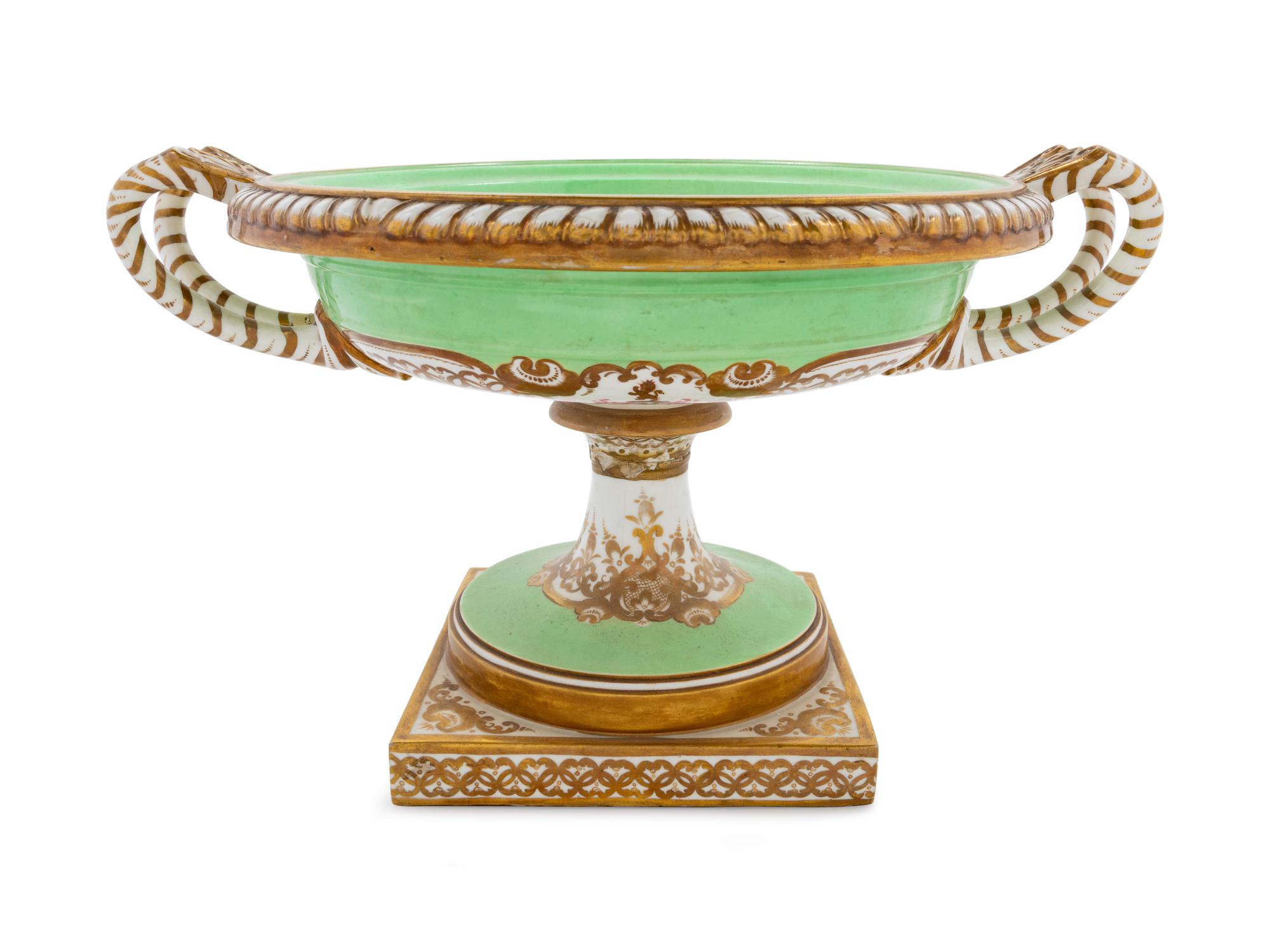 A Group of English Parcel Gilt Porcelain Table Articles