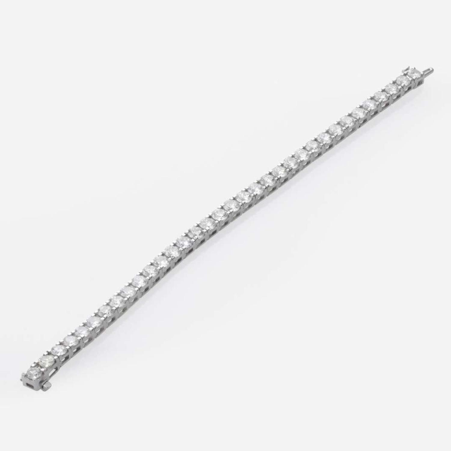 A Diamond and 18K White Gold Tennis Bracelet