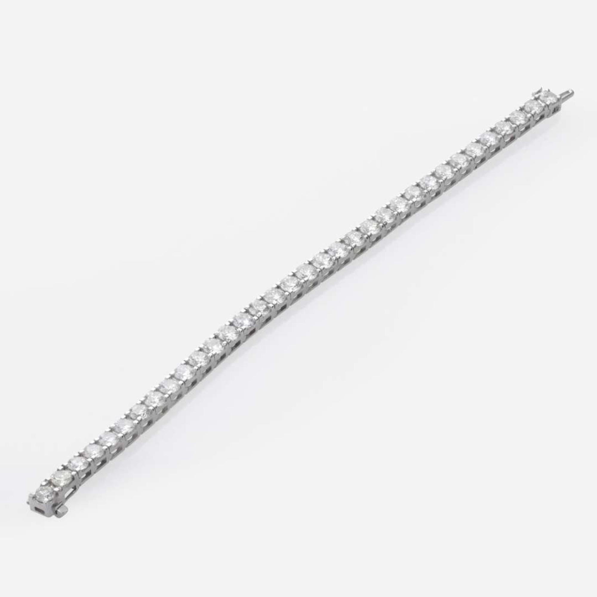 A Diamond and 18K White Gold Tennis Bracelet