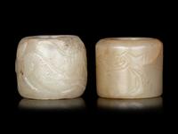 Two Carved Celadon Jade Archer's Rings