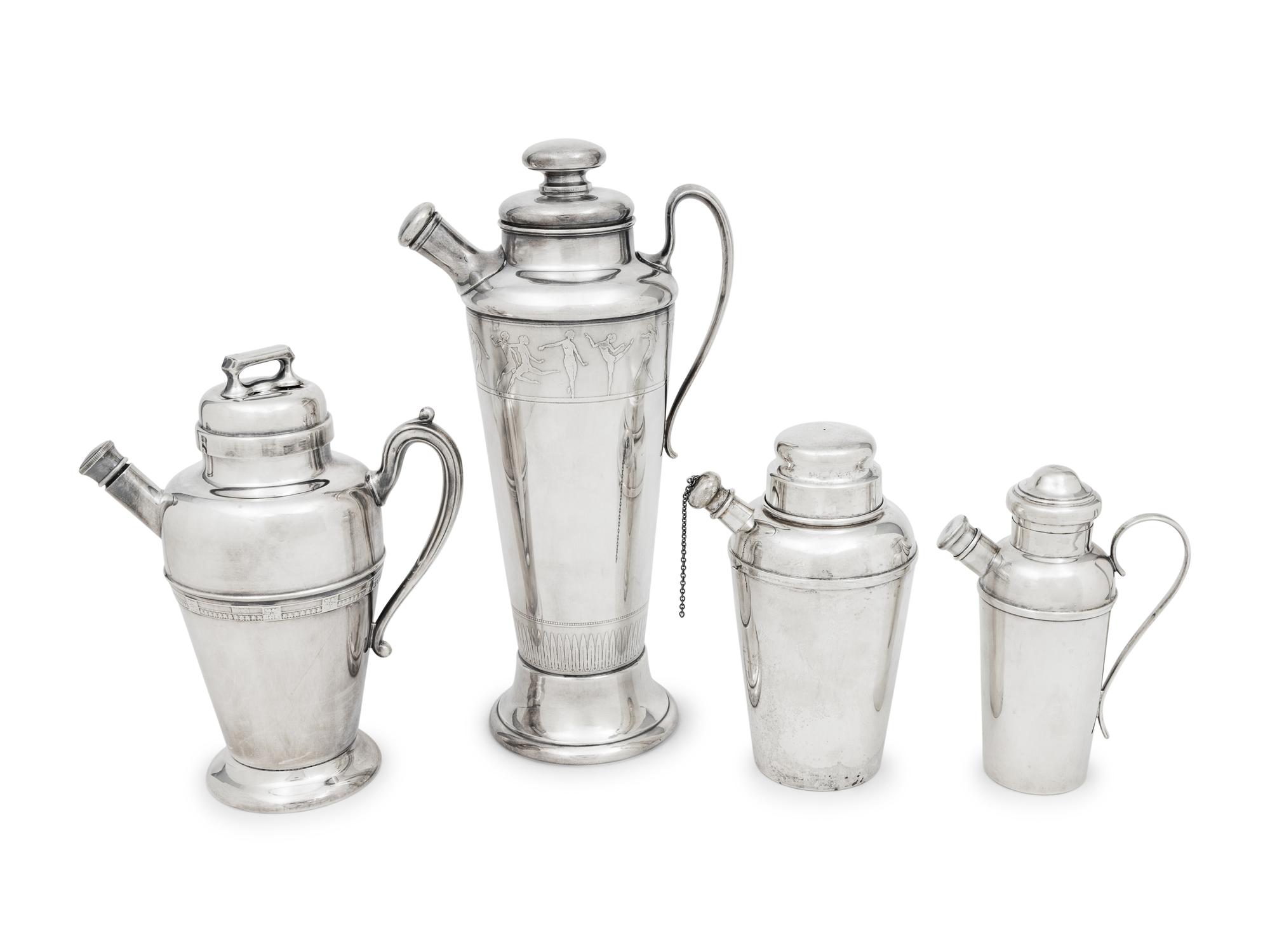 A Group of Four Cocktail Shakers