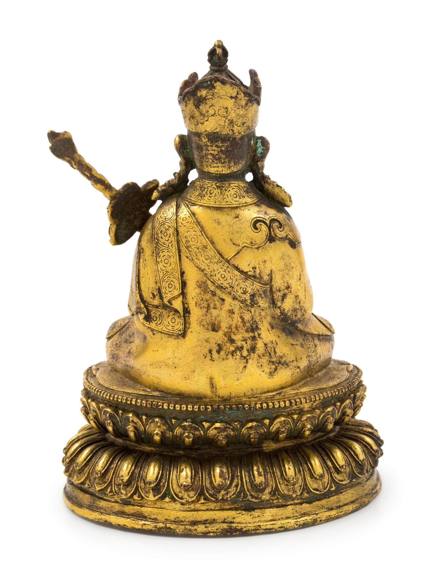 A Sino-Tibetan Gilt Bronze Figure of Padmasambava