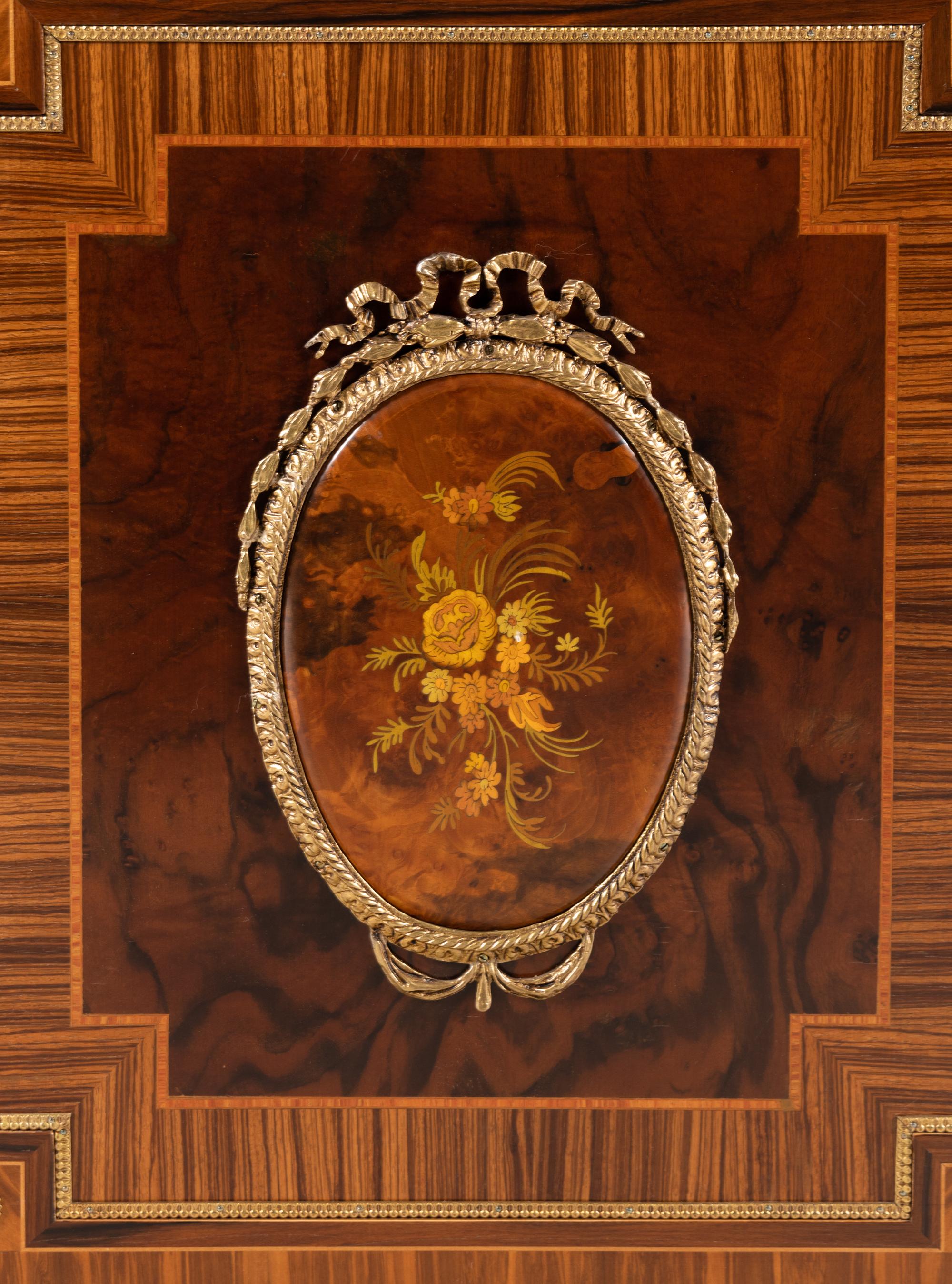 A Louis XVI Style Gilt Bronze Mounted Various Woods Console Cabinet