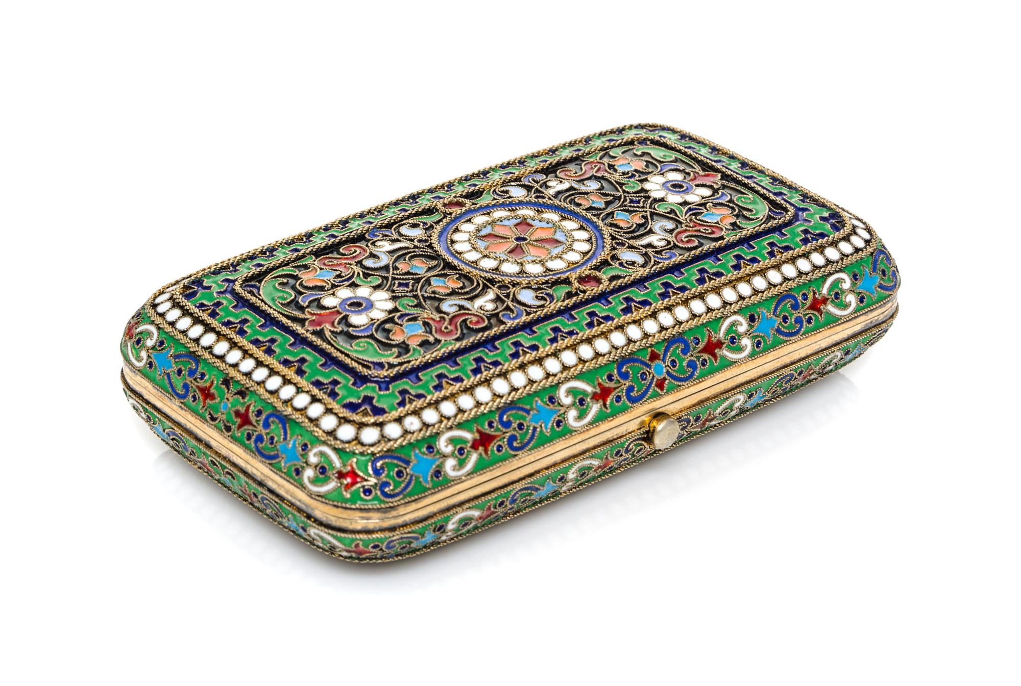 A Russian Enameled Silver-Gilt Cigarette Case, Possibly Mark Ovchinnikov, Moscow, Late 19th Century, of rectangular form with floral de
