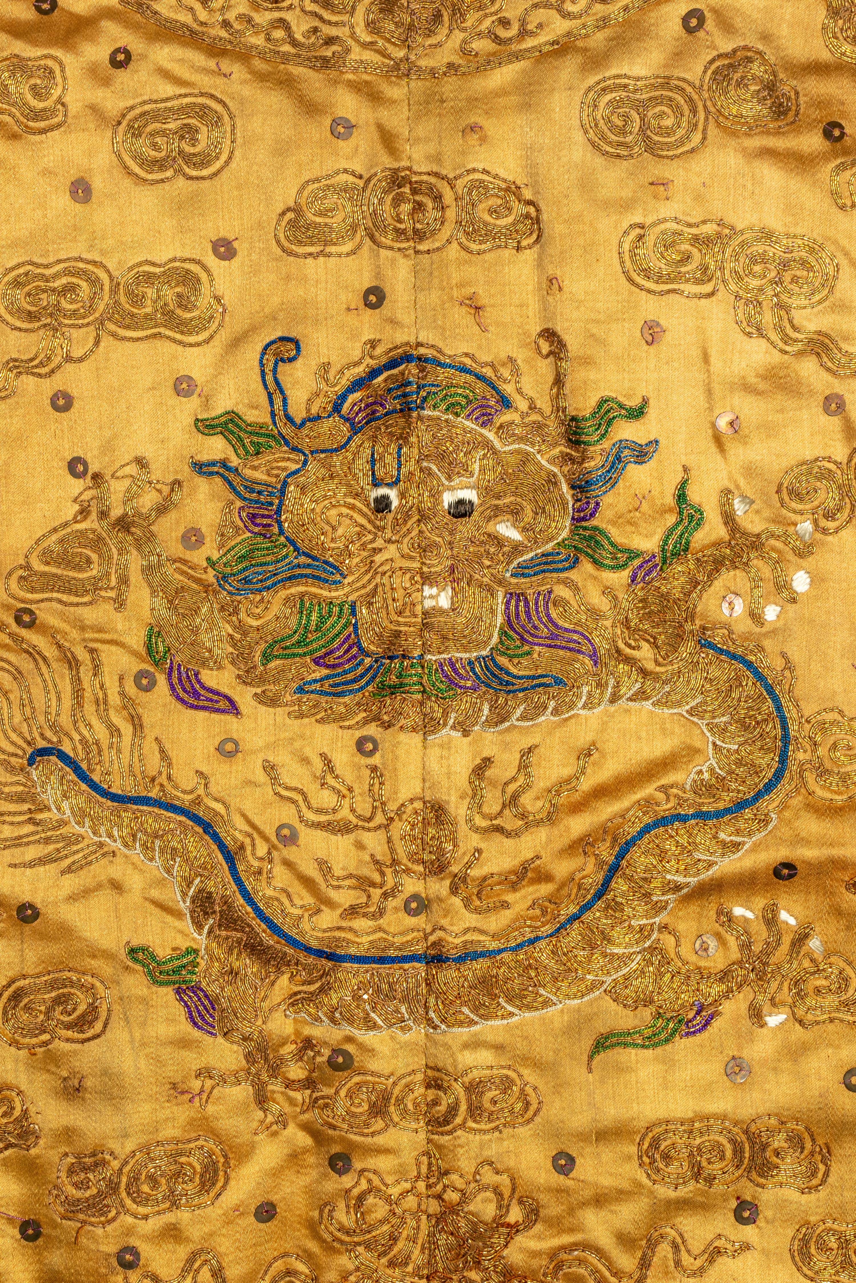 A Chinese Yellow Ground Embroidered Silk Dragon Robe