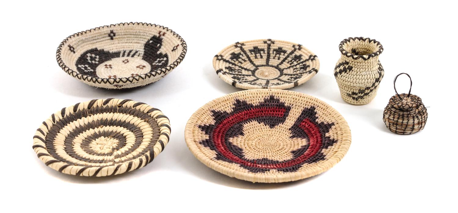 Six Miniature Southwestern Baskets Diameter of largest 3 1/3 inches.