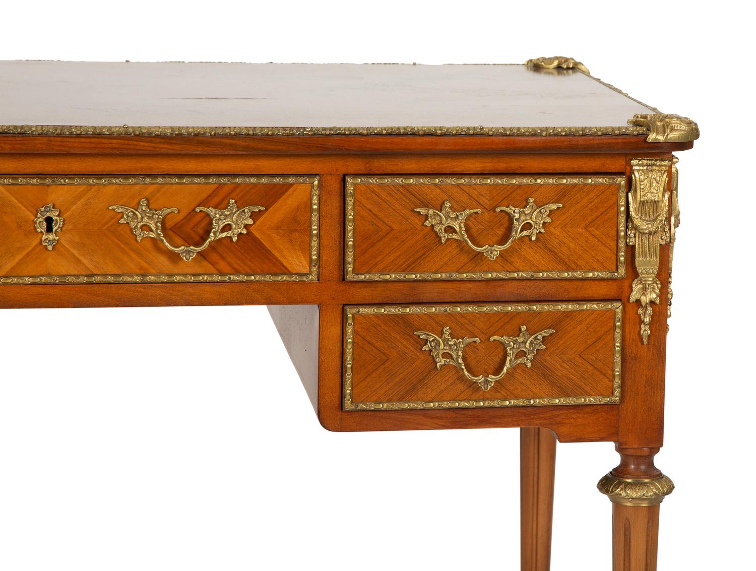 A Louis XVI Style Gilt-Bronze Mounted Mahogany Bureau Plat