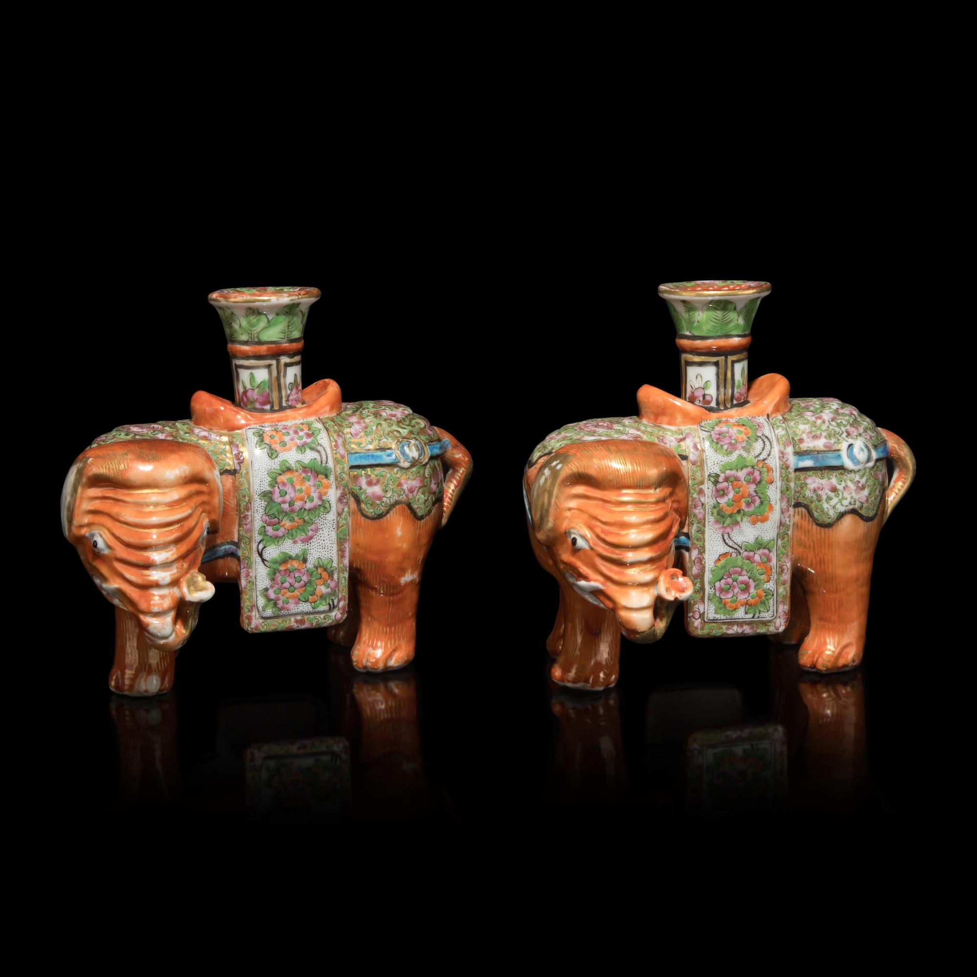 A Pair of Chinese Famille Rose Porcelain Elephant-Form Candle Holders, 19th Century 清晚期 粉彩太平有象燭臺一對