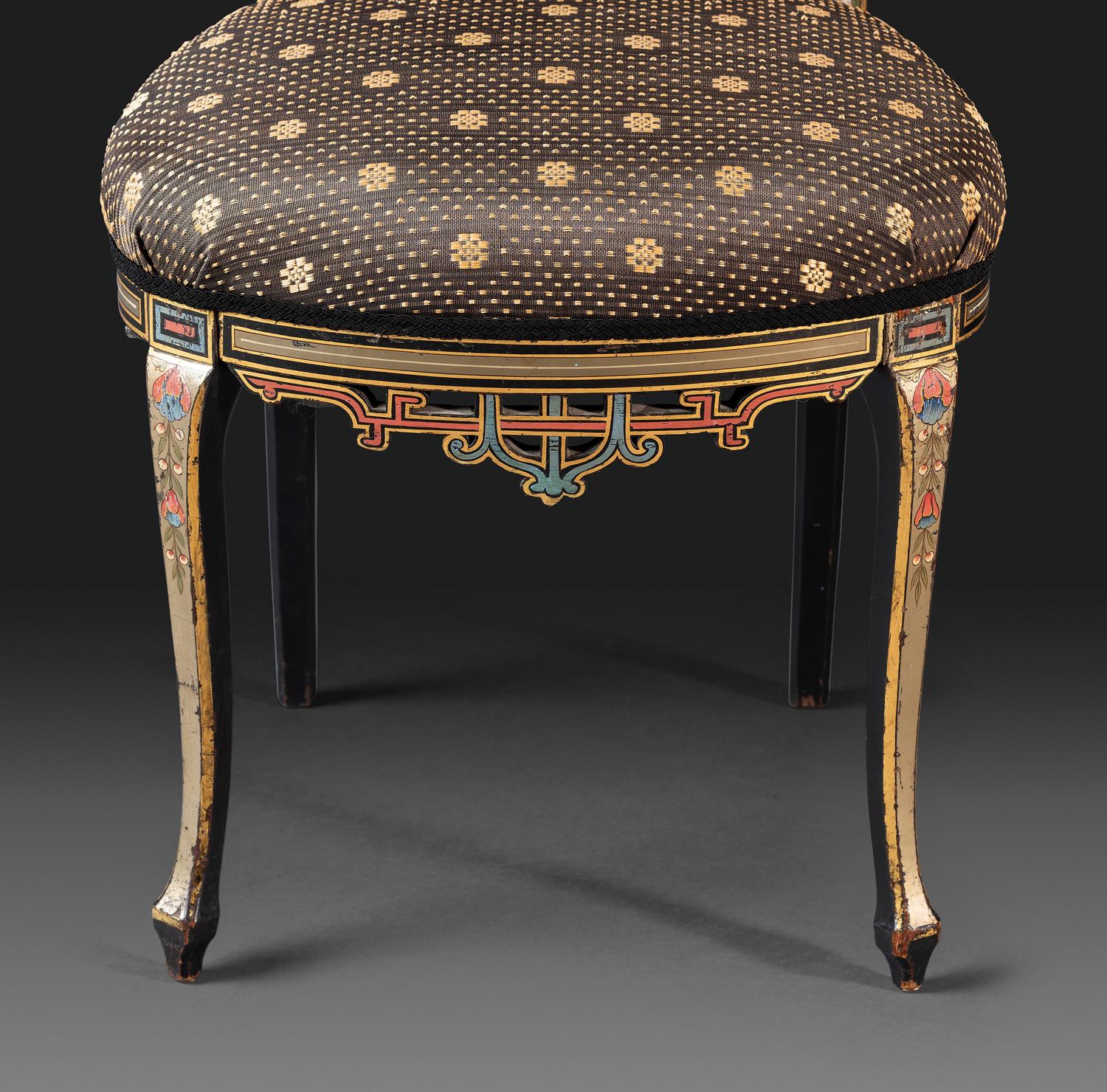 An Aesthetic Movement Painted, Parcel Gilt and Ebonized Bird-Carved Side Chair