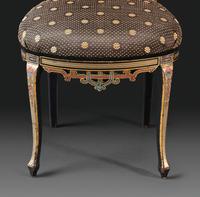 An Aesthetic Movement Painted, Parcel Gilt and Ebonized Bird-Carved Side Chair
