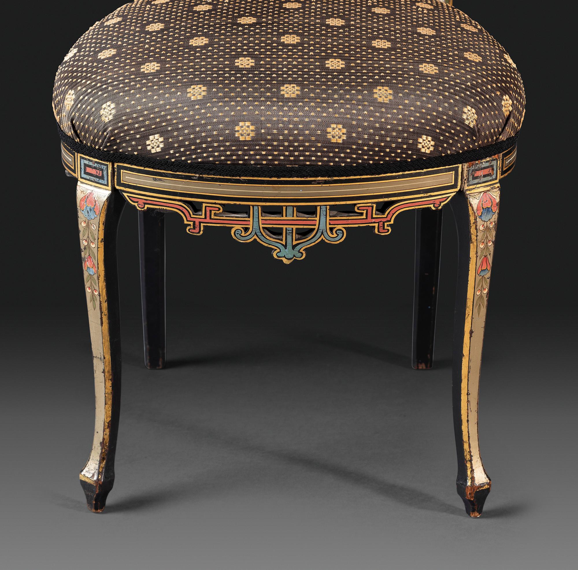 An Aesthetic Movement Painted, Parcel Gilt and Ebonized Bird-Carved Side Chair