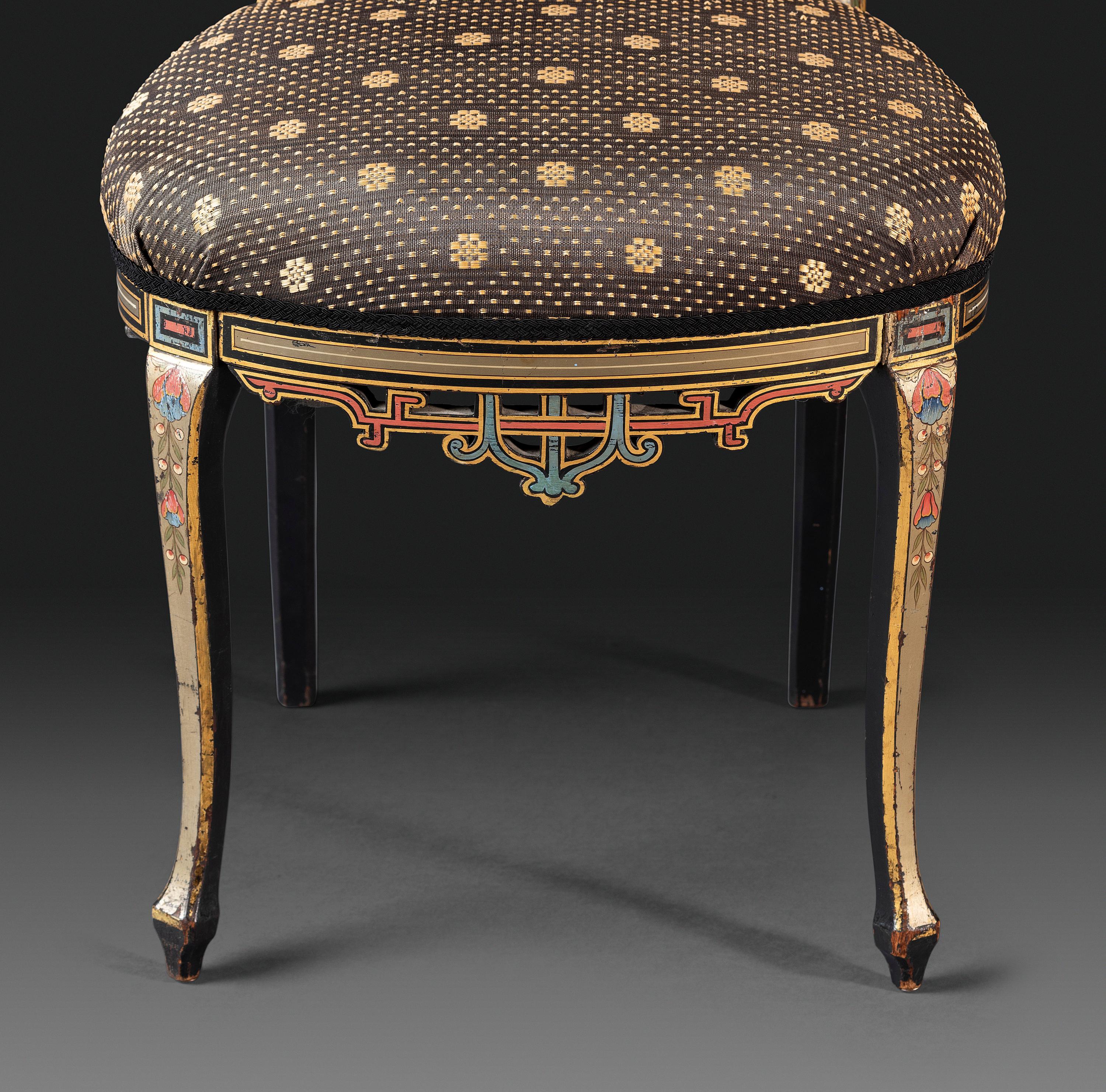 An Aesthetic Movement Painted, Parcel Gilt and Ebonized Bird-Carved Side Chair