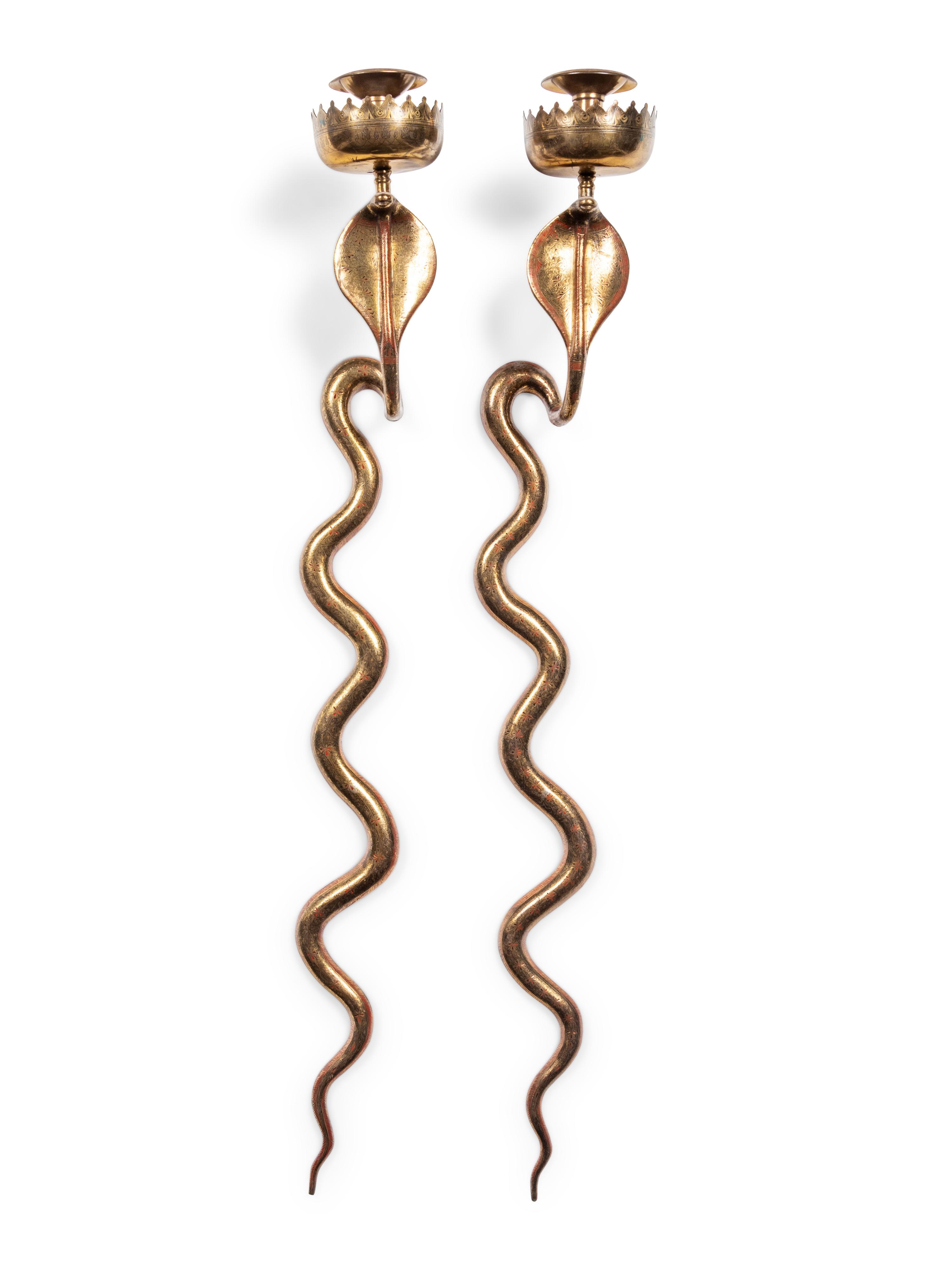 A Pair of Brass Cobra Single-Light Sconces and a Bronze Single-Light Cobra Sconce