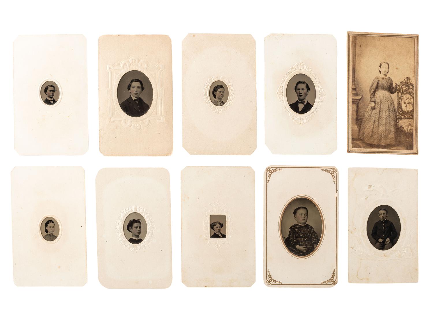 [EARLY PHOTOGRAPHY]. A group of 24 daguerreotypes, ambrotypes, tintypes, and CDVs of children of varying ages, incl. a young boy posed with his dog.