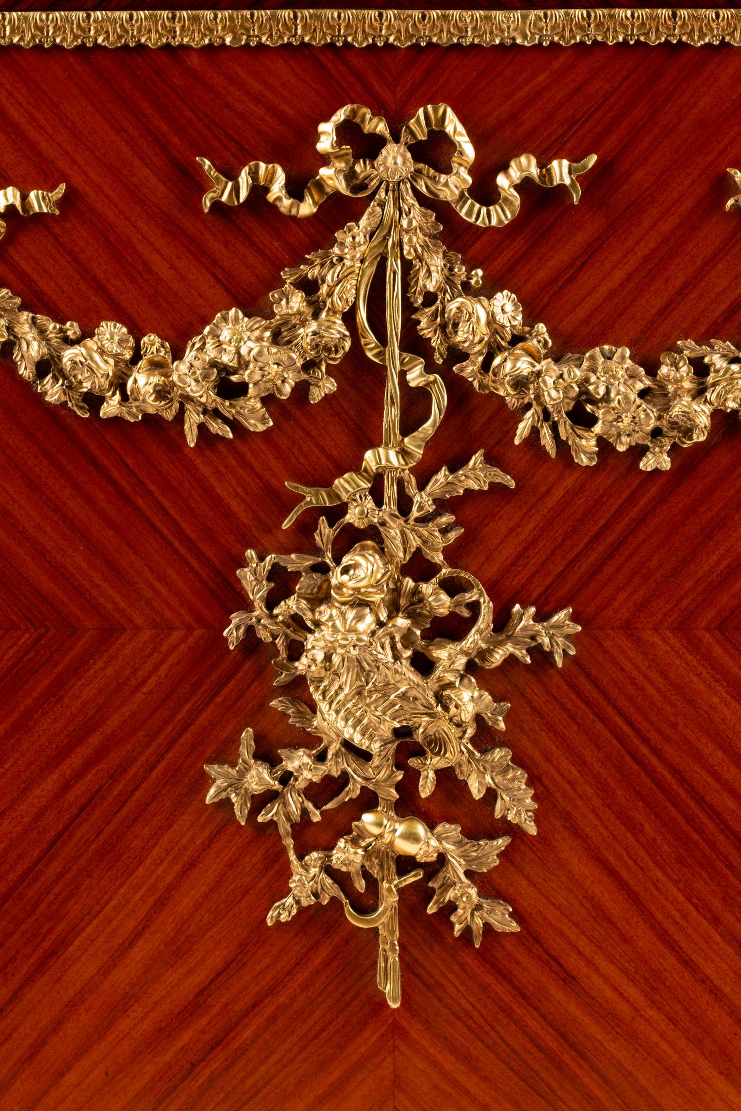 A Louis XVI Style Gilt Bronze Mounted Kingwood and Rosewood Cabinet
