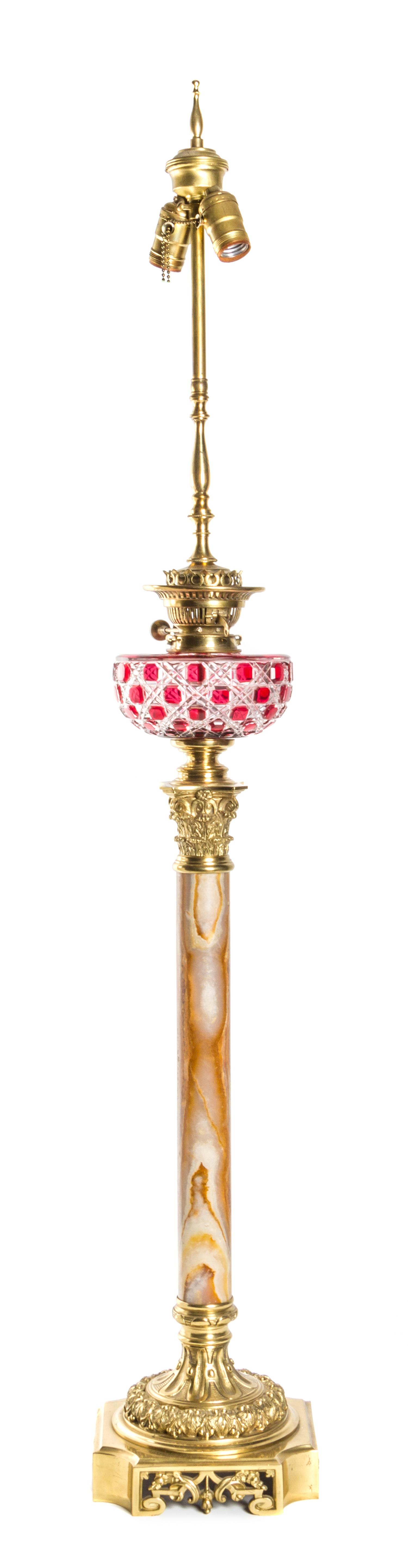 A Continental Cut Glass, Onyx And Gilt Metal Mounted Oil Lamp, Height 33 inches.
