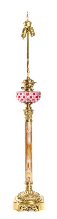 A Continental Cut Glass, Onyx And Gilt Metal Mounted Oil Lamp, Height 33 inches.