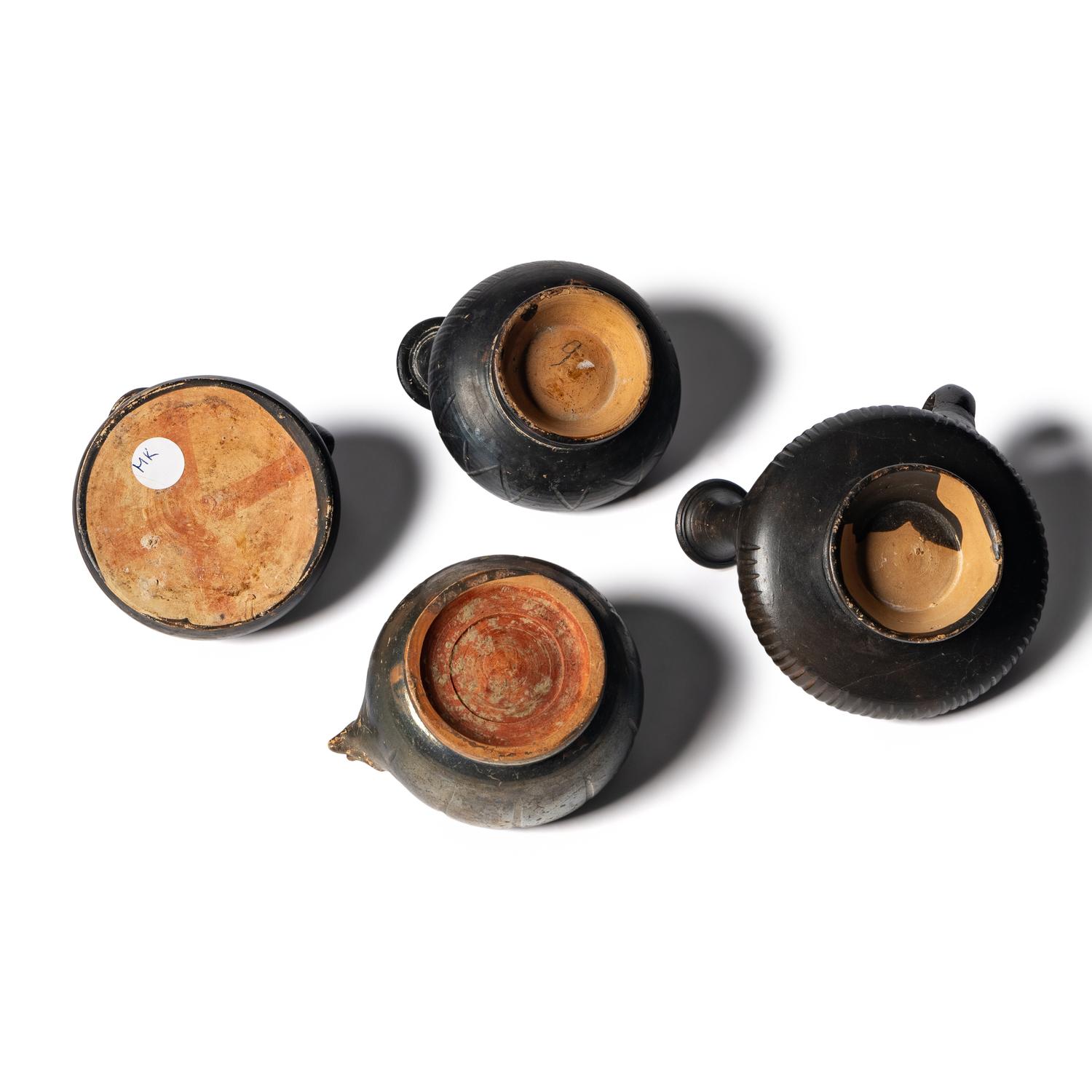 Four Greek Black-Glazed Vessels