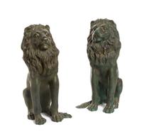 A Pair of Cast Metal Lions, Height 19 inches.