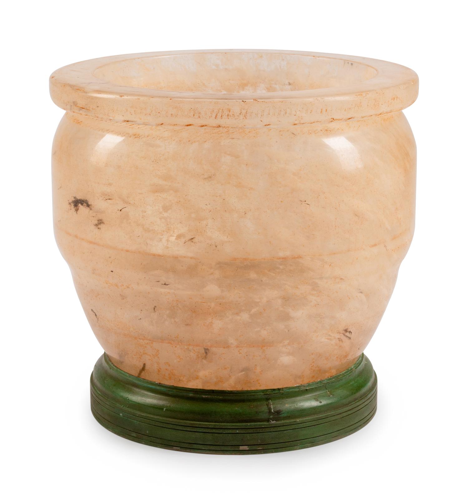 A Large Quartz Bowl on a Patinated Bronze Stand