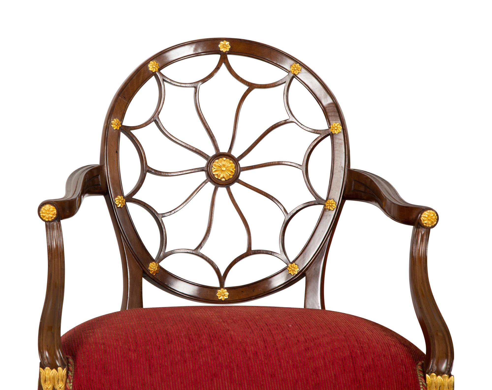 A Set of Eight George III Style Mahogany Wheel Back Armchairs.