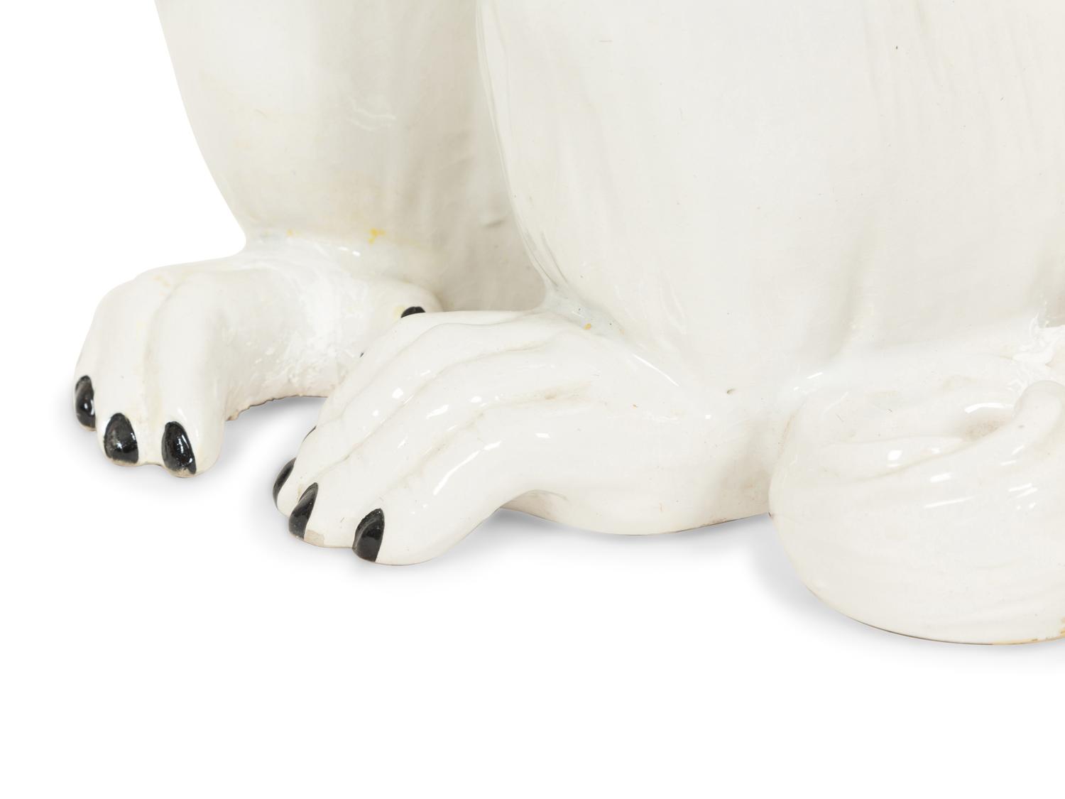 An Italian White Glazed Ceramic Monkey