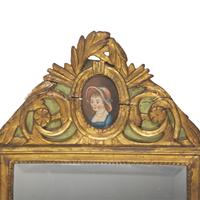 A Neoclassical Green-Painted and Parcel-Gilt Mirror Inset with Portrait of a Lady