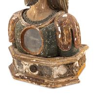 A Spanish Carved Wood and Polychrome Decorated Reliquary Bust