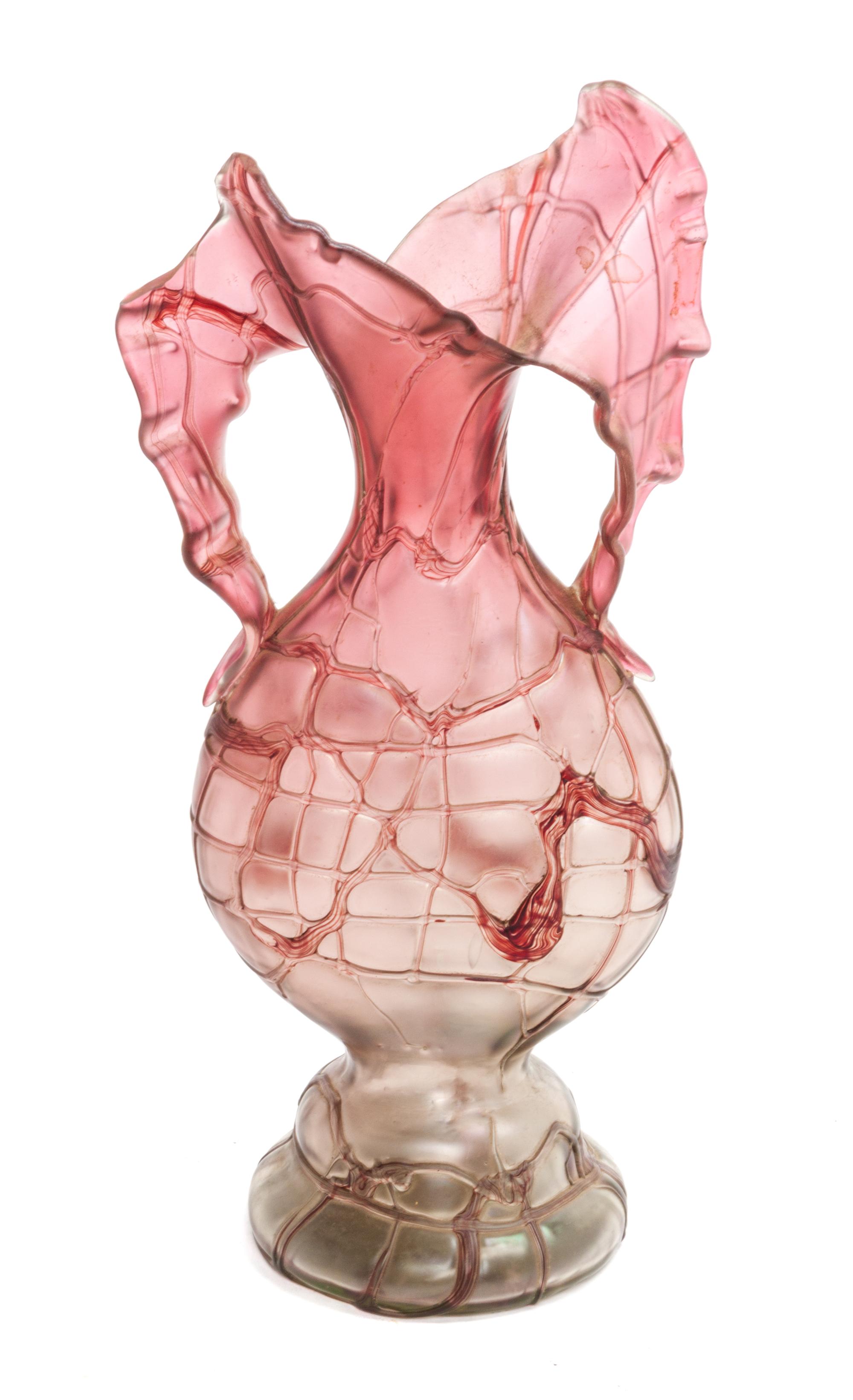 An Iridescent Glass Bottle Height 11 inches. — MANNER OF LOETZ
