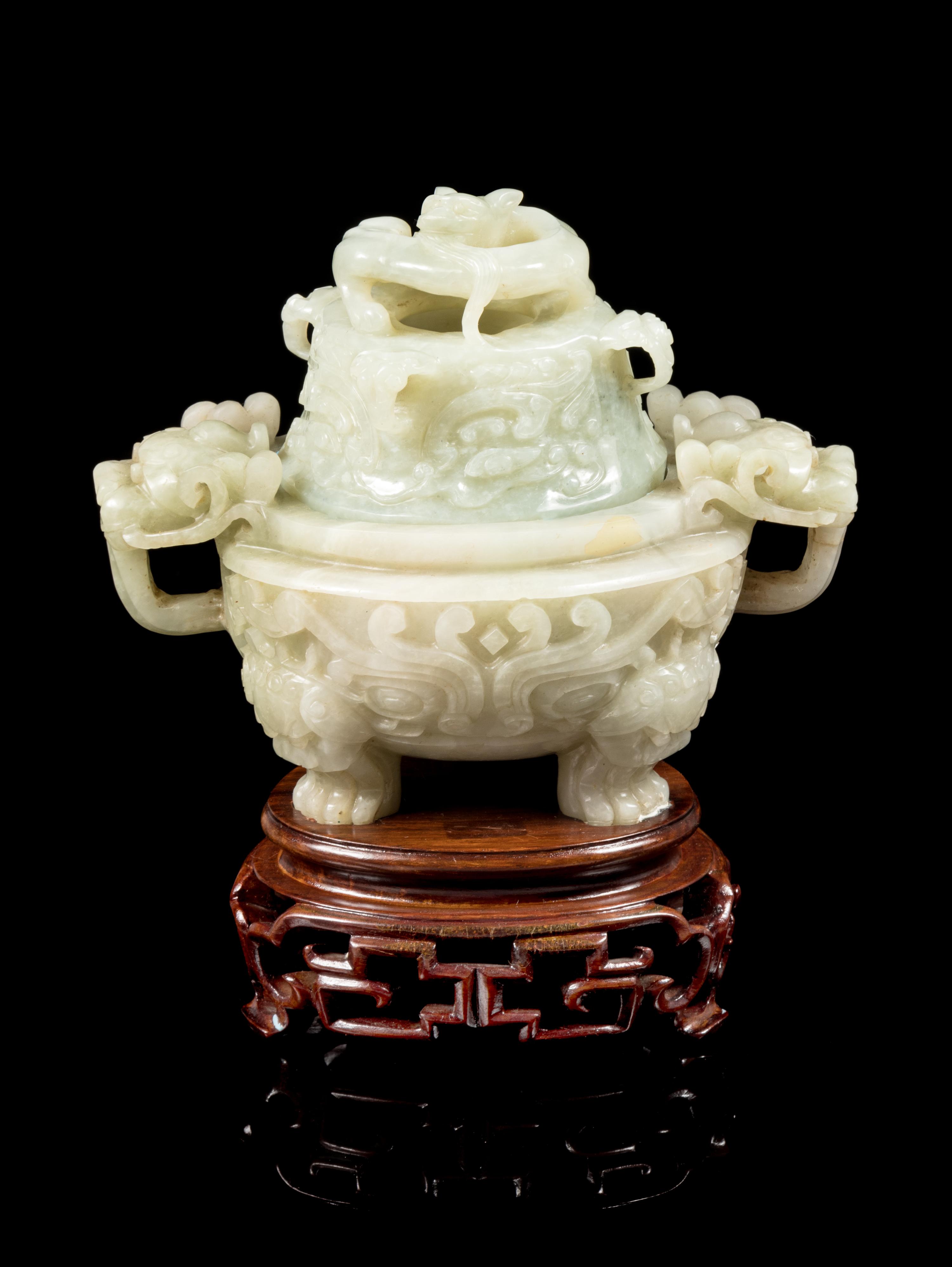 A Celadon Jade 'Taotie' Incense Burner Height 4 3/4 inches. — 19TH/EARLY 20TH CENTURY