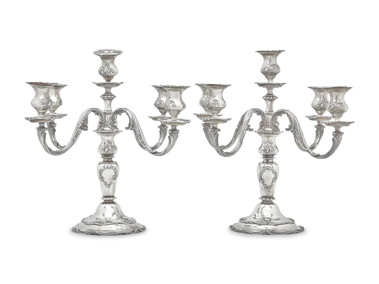A Pair of American Silver Floral Repousse Five-Light Candelabra