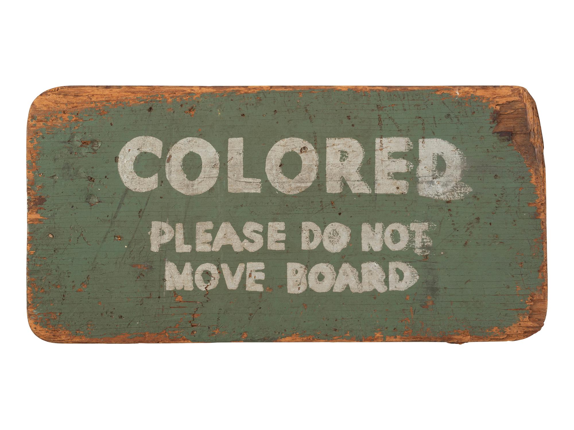 [CIVIL RIGHTS -- SEGREGATION]. Montgomery bus sign, "Colored / Please Do Not Move Board." [Montgomery, AL], [1949].